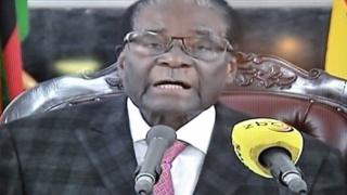 テレビ演説するムガベ大統領(19日)