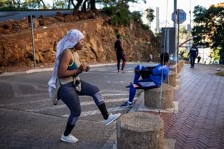 Woman training on the street