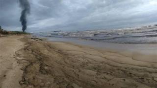 A handout photo made available by environmental activist Samuel Cabrera shows part of the oil contamination at El Palito beach in Puerto Cabello, Venezuela, 10 August 2020 (issued 12 August 2020).