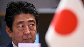 Japan's Prime Minister Shinzo Abe looks on ahead of a Asia Europe Meeting (ASEM) at the European Council in Brussels on October 19, 2018.