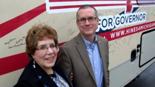 Jim Hines and his wife Martha in front of the "Hinesmobile"