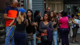 Relatives of victims of the stampede in the El Paraiso club in front of the police headquarters in Caracas, Venezuela, 16 June 2018