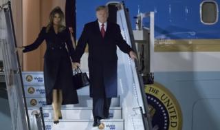 US President Donald Trump and First Lady Melania Trump disembark Air Force One at Orly airport, near Paris, on 9 November 2018