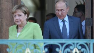 Путин и Меркель