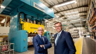 Jonathan Holmes (left), managing director of Creative Composites Ltd with Alastair Hamilton, chief executive officer of Invest NI