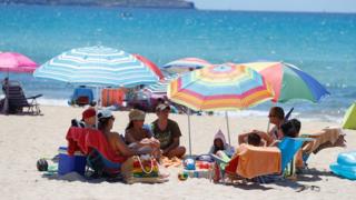 Tourists on a beach in Majorca, 21 Jun 20