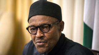 A file photo taken on 14 June 2015 shows Nigerian president Muhammadu Buhari giving an interview to Agence France-presse at his hotel during the 25th African Summit in Johannesburg