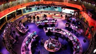 The newsroom at the headquarters of the Qatar-based Al Jazeera English-language channel in Doha, 7 February