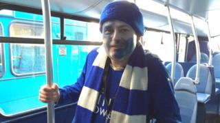 Backing the Blues bus driver