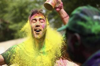 Australian Cricketer Glenn Maxwell celebrates Holi Festival of Colours with Chandigarh locals ahead of the ICC WT20 match between Australia and Pakistan on March 24, 2016 in Chandigarh, India