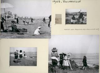 A family album page showing beach holiday photographs