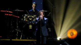 Eddie Vedder of Pearl Jam performs on stage