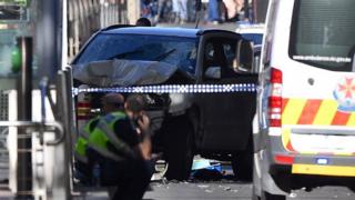 A crashed car that struck pedestrians on Flinders Street, Melbourne, 21 December