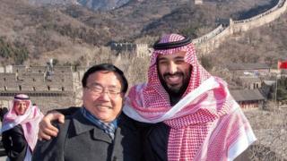 Crown Prince Mohammed bin Salman poses for camera with the Chinese Ambassador to Saudi Arabia Li Huaxin during a visit to Great Wall of China in Beijing, China February 21, 2019.