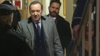 Spacey leaving court