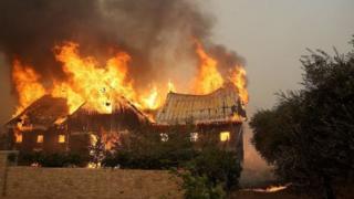 At least fourteen fires are burning across eight Californian counties