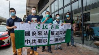 Pro-democracy lawmakers march to China's Liaison Office in Hong Kong