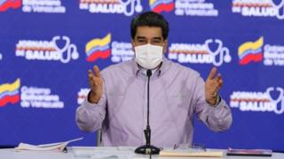 A handout photo made available by Miraflores press shows Venezuelan President Nicolas Maduro addressing members of his government cabinet, in Caracas, Venezuela