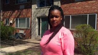 Lashonda Moreland outside of the home where she was arrested