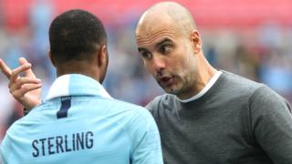 Manchester City boss Pep Guardiola with Raheem Sterling after the FA Cup win over Watford