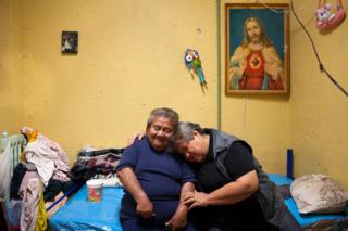 Residents of Casa Xochiquetzal hug