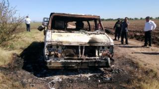 Mexican authorities inspect a burnt out van suspected to belong to a couple of Australian tourists missing for more than a week, in Sinaloa, Mexico on 21 November, 2015.