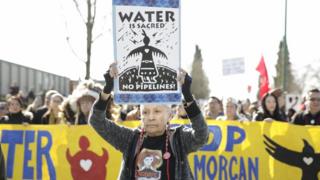 Harriet Prince, 76, of the Anishinaabe tribe marches with Coast Salish Water Protectors and others against the expansion of Trans Mountain pipeline on 10 March 2018