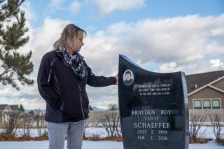 Melissa Schaeffer at her son's grave in Helena