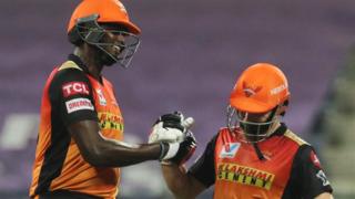 Jason Holder and Kane Williamson