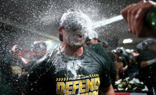 Jed Lowrie of the Oakland Athletics celebrates.