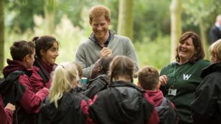 Prince Harry chats to youngsters