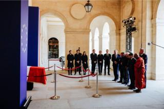 Religious authorities pay their respects at the coffin of late French President Jacques Chirac on 29 September 2019