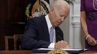 Joe Biden Signs Into Law Landmark Gun Control Bill - BBC News