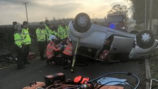 Car upside down after crash in Marholm