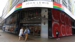 Two people walk into a John Lewis