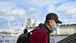 A man wearing a face mask in London