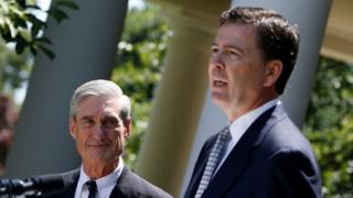 Robert Mueller (L) with his successor at the FBI James Comey,
