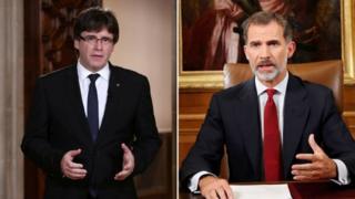 Carles Puigdemont (trái) chỉ trích diễn văn của nhà vua Tây Ban Nha Felipe VI
