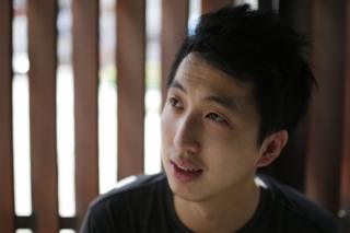 In this 24 August 2015, file photo, Hong Kong photojournalist Hok Chun Anthony Kwan speaks to reporters after leaving Samut Prakan provincial court after he was released on bail following his arrest at Suvarnabhumi Airport in Bangkok, Thailand, for carrying body armour and a helmet onto a flight bound for Hong Kong.