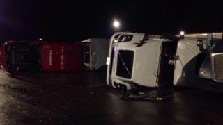 Trucks are seen overturned in the aftermath of the tornado near Circeville, a town east of Dayton, in Ohio