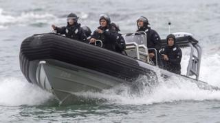 Crew from the HMNZS Wellington return to shore to drop off supplies