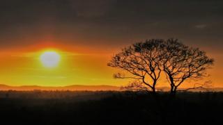 The sun setting over Leicestershire, from the top of Saxelby, after it had just stopped raining