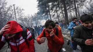 Migrants are met by tear gas as they try to enter Greece