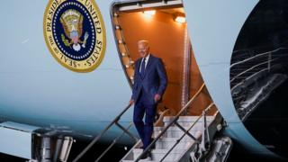 Joe Biden on the steps of Air Force One