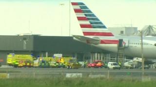 Emergency vehicles near an American Airlines plane at Dublin airport