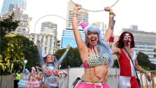 Participants enjoy the 38th annual Gay and Lesbian Mardi Gras parade in Sydney, Australia, 05 March 2016.