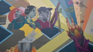 A mural designed by the "Lidera la Vida" campaign is unveiled in in Bogota on 31 January, 2020.