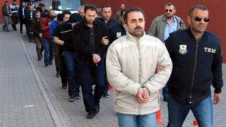 member of Turkish police escort Gulen members