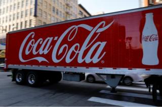 A Coca-Cola truck makes its way through downtown Los Angeles, California