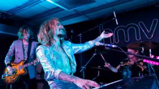 The Darkness performing at HMV's Oxford Street store